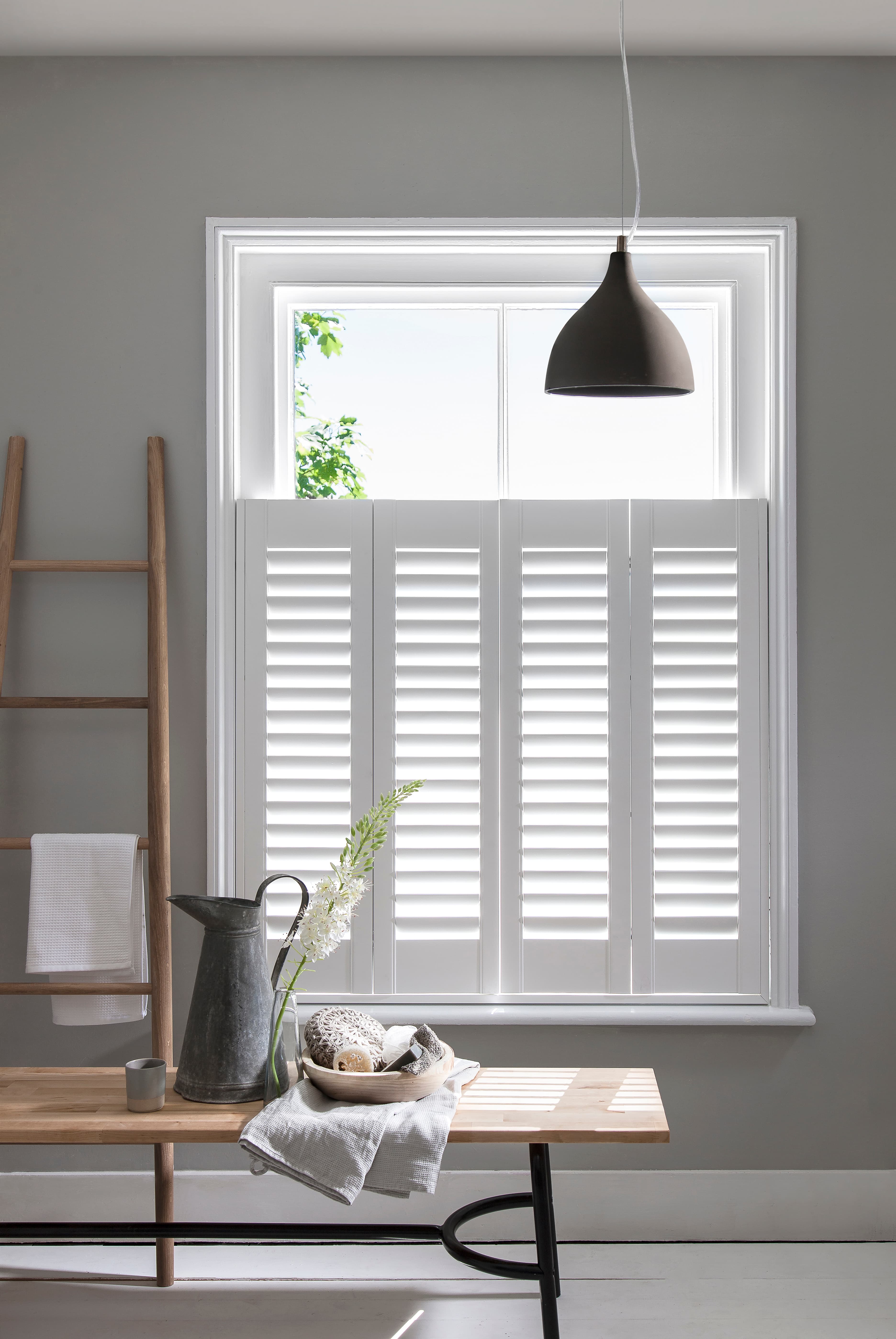 Café style shutters open in a lounge