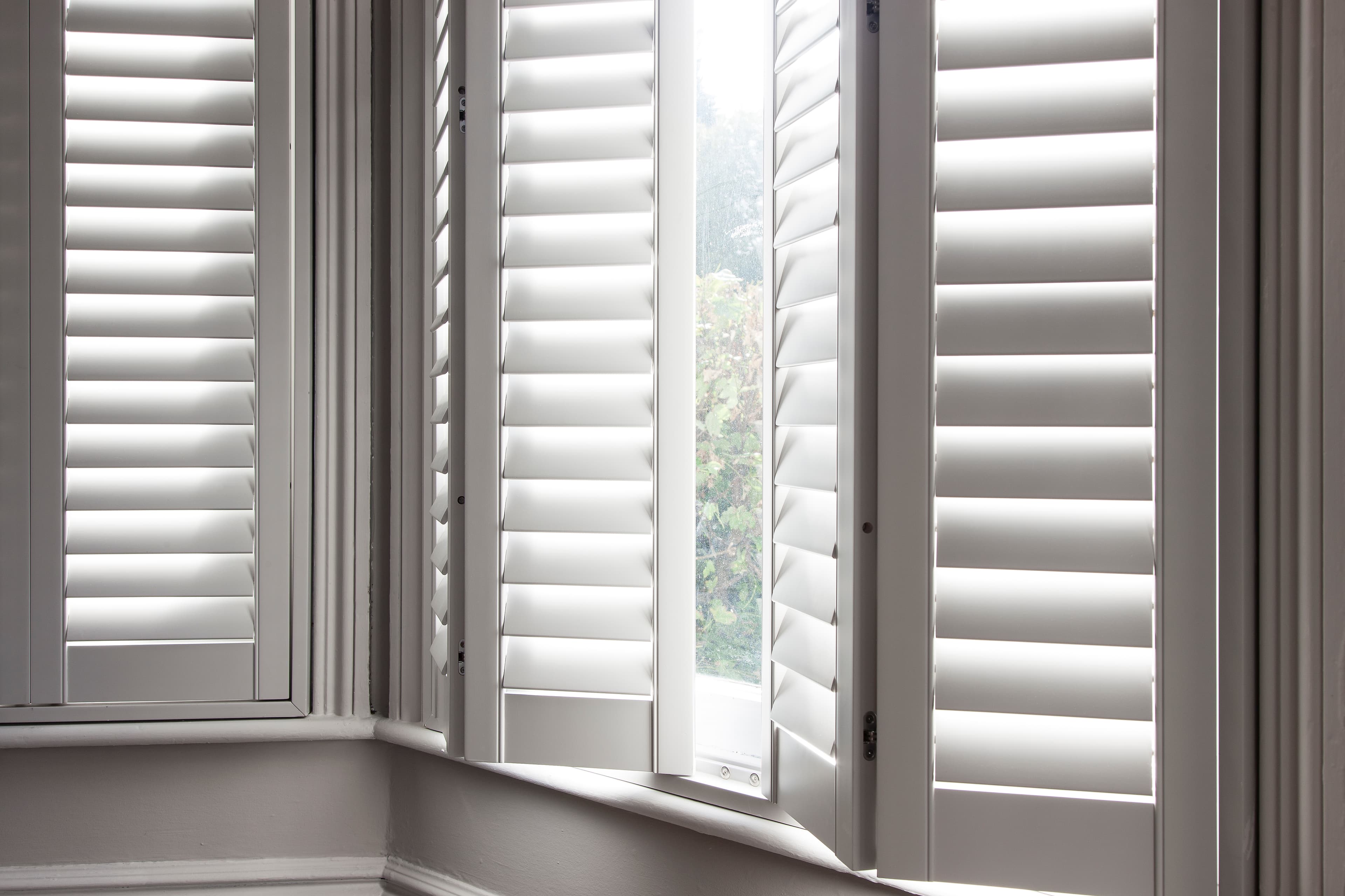 Taupe Bay Shutters open