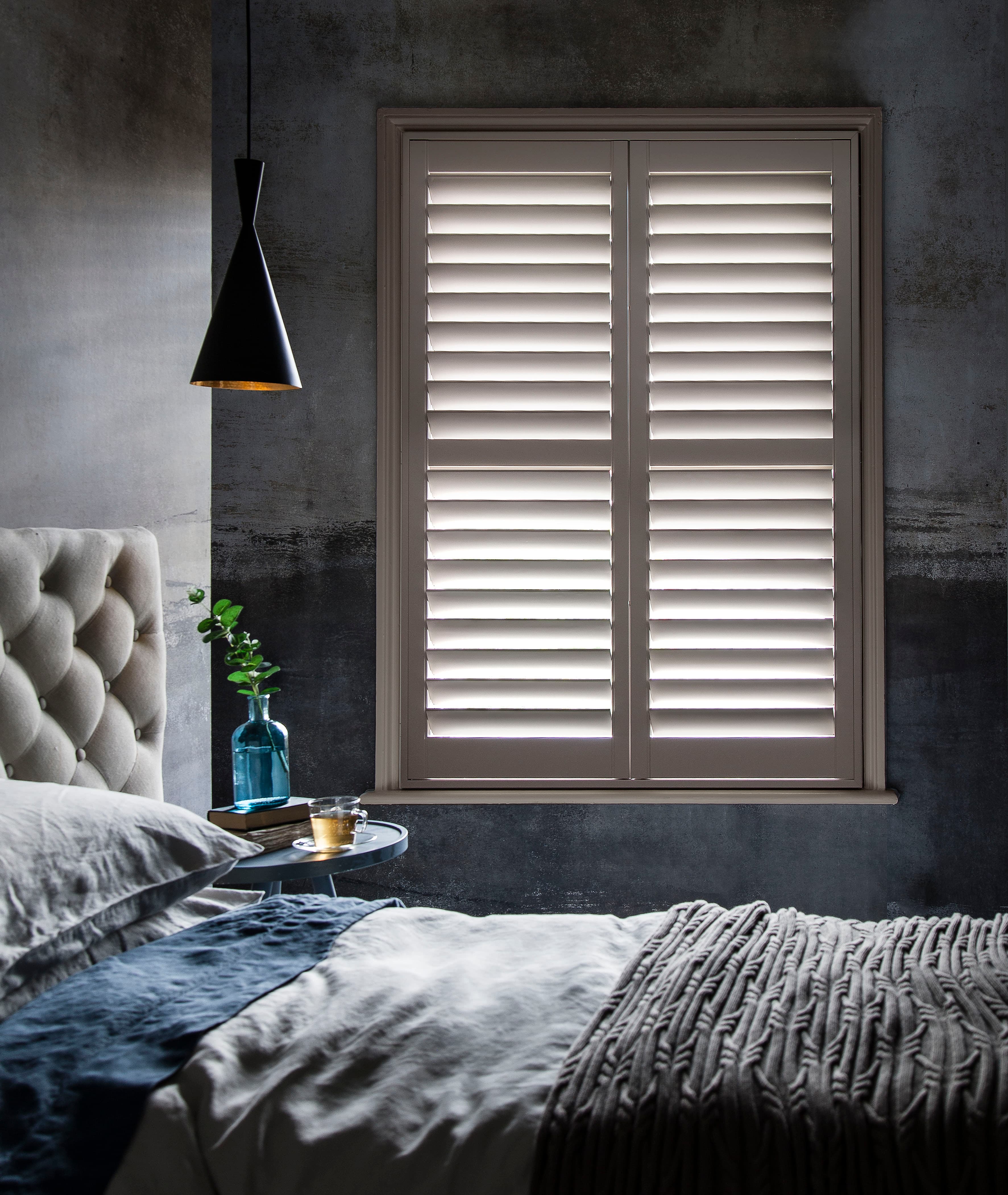 Full height shutters in bay window