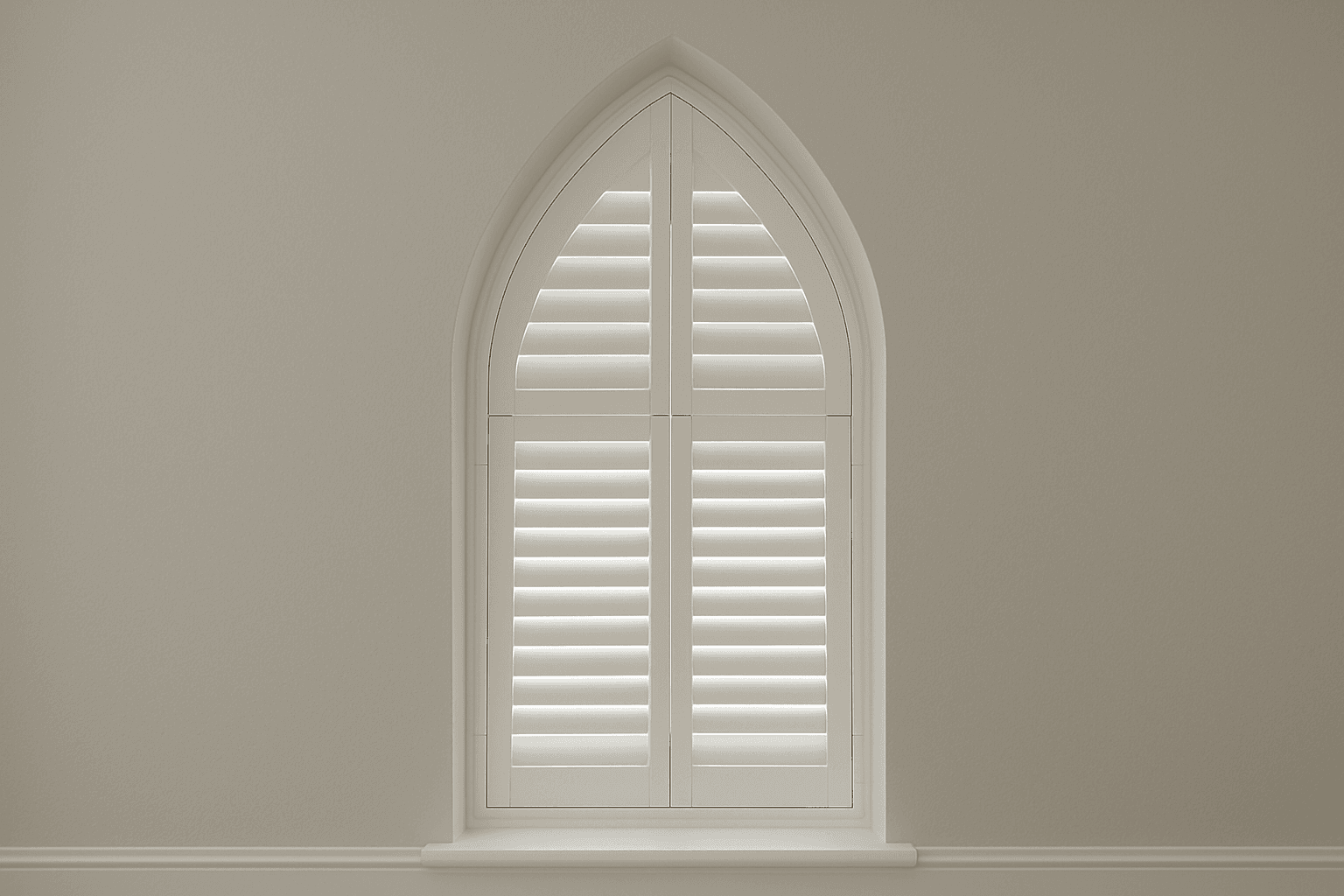 Shaped shutters fitted to a gothig window